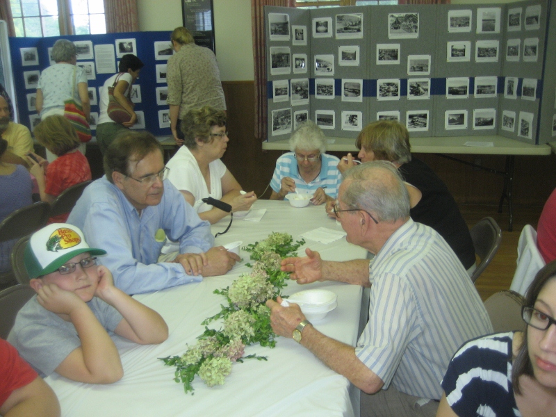 18 John Babina talking with a guest 8-25-12 (800x600).jpg